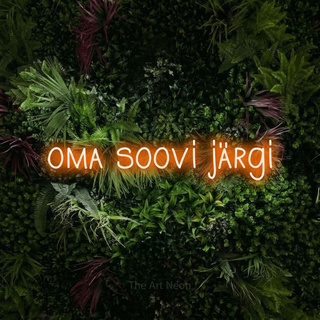 LED neon sign reading “oma soovi järgi”, arranged in a single line.