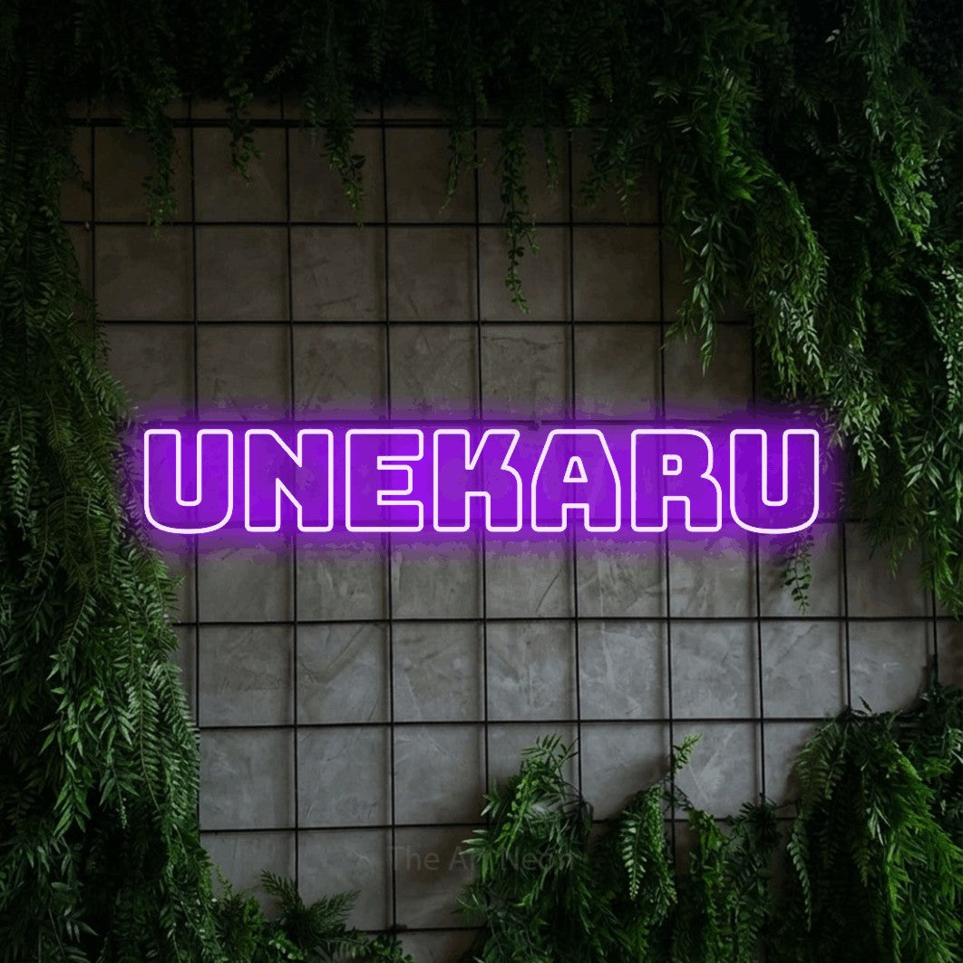 LED neon sign reading “UNEKARU”, arranged in a single line.