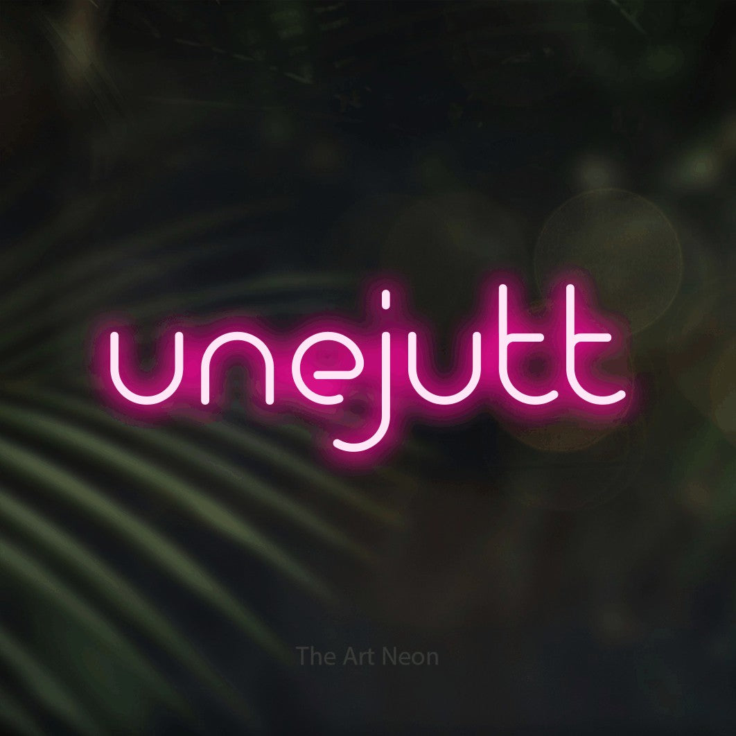 LED neon sign reading “unejutt”, arranged in a single line.