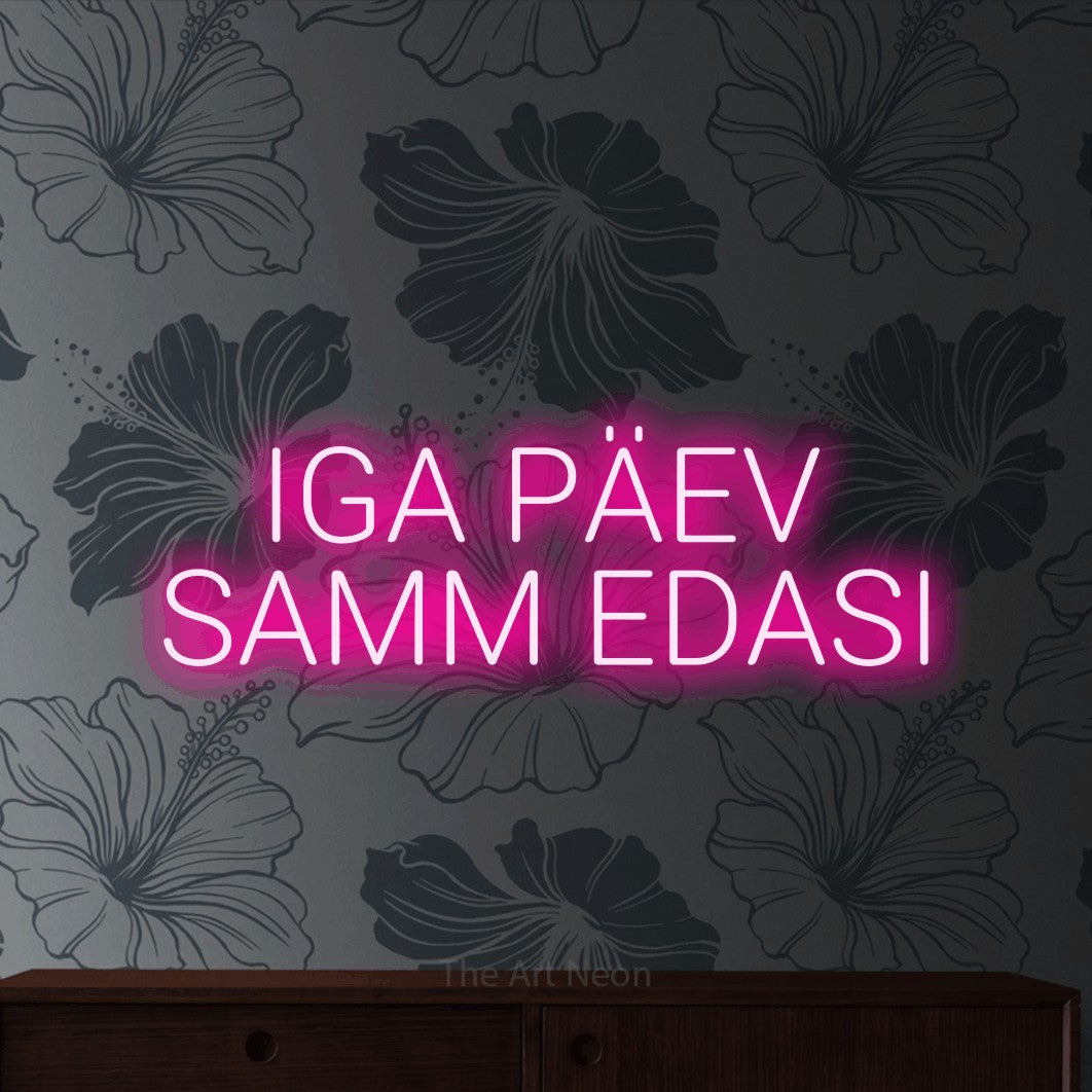 LED neon sign reading “IGA PÄEV SAMM EDASI”, arranged in 2 lines.