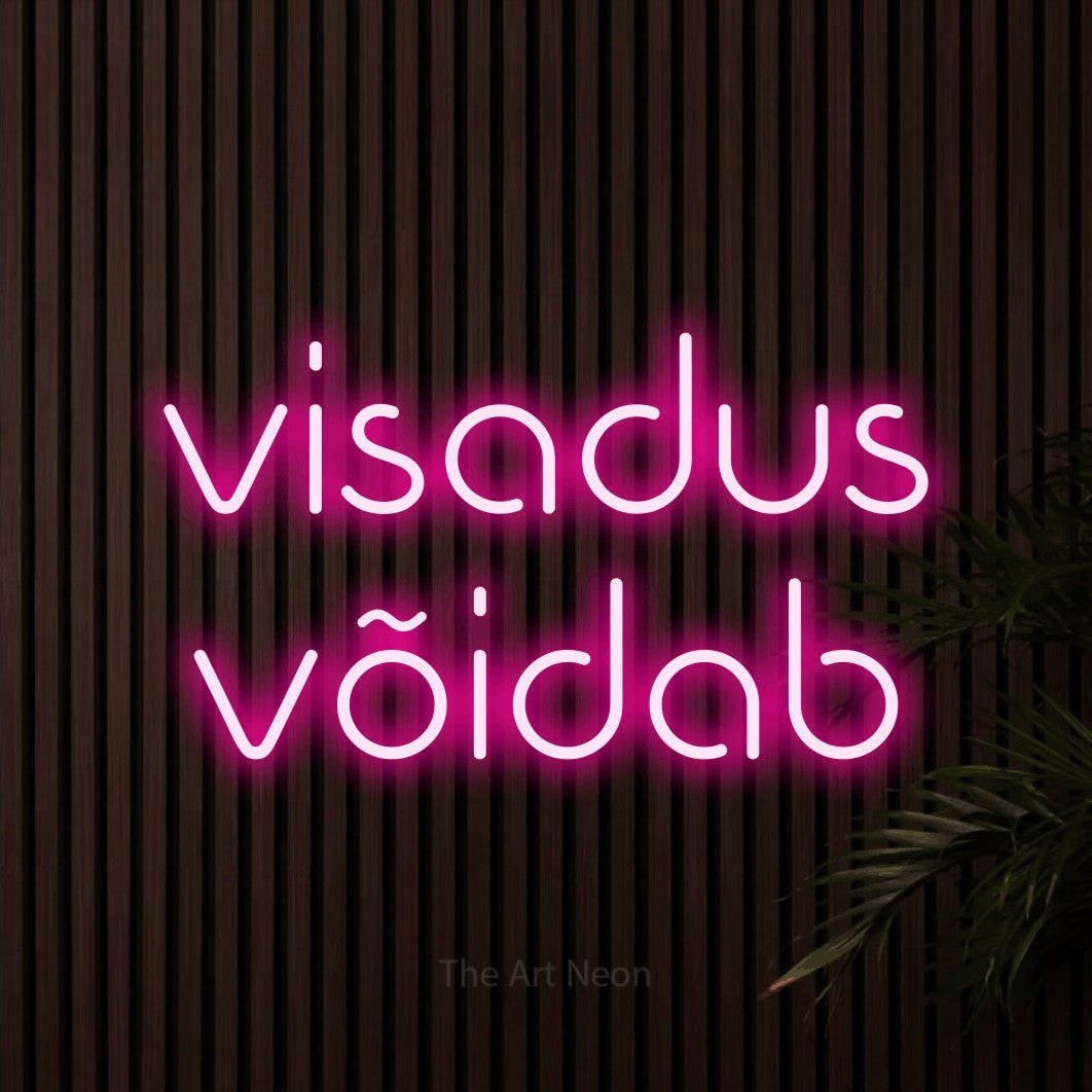 LED neon sign reading “visadus võidab”, arranged in 2 lines.