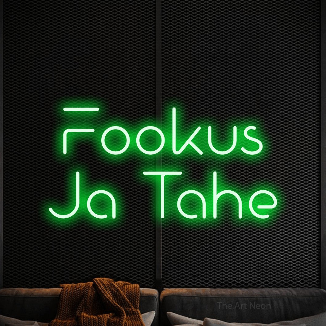 LED neon sign reading “Fookus Ja Tahe”, arranged in 2 lines.