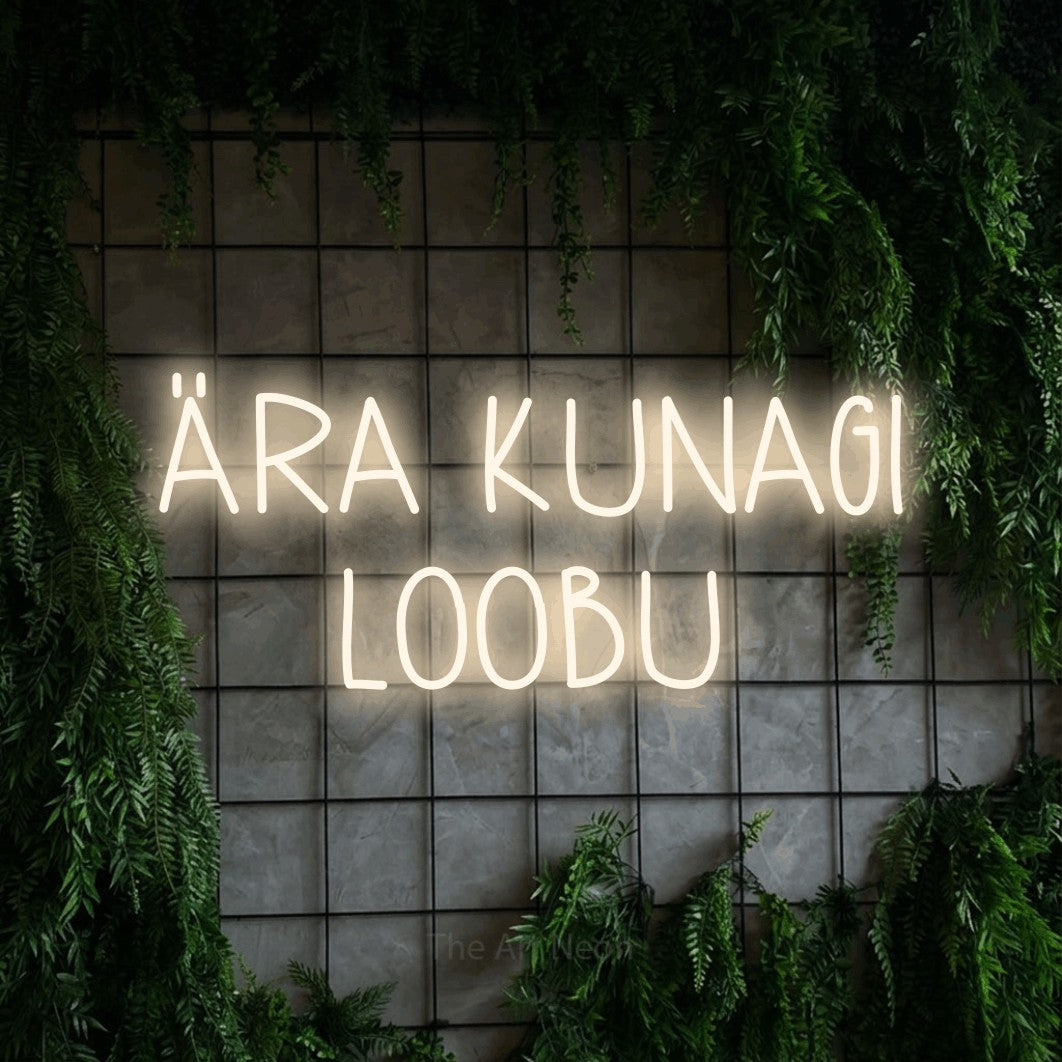 LED neon sign reading “ÄRA KUNAGI LOOBU”, arranged in 2 lines.