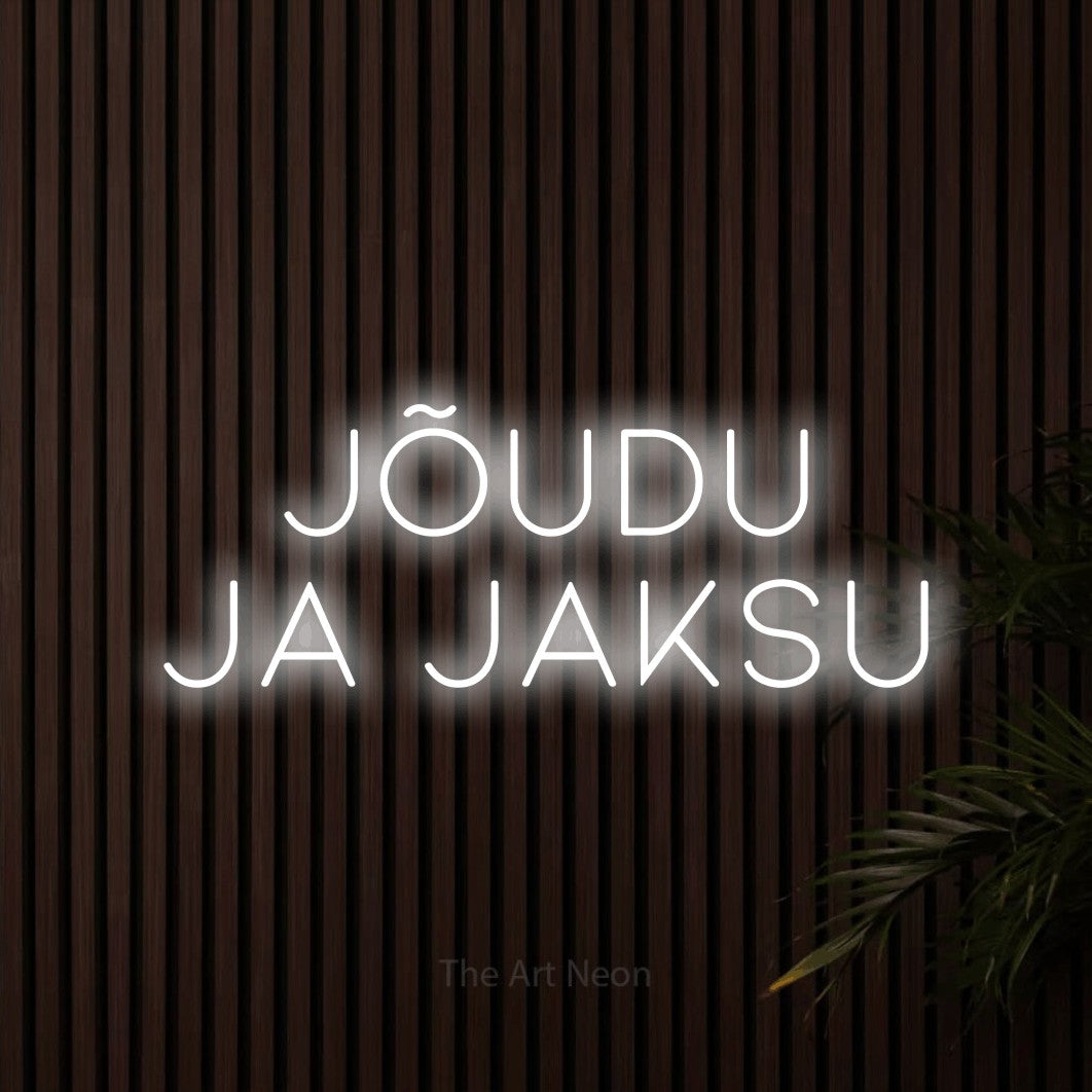LED neon sign reading “Jõudu Ja Jaksu”, arranged in 2 lines.