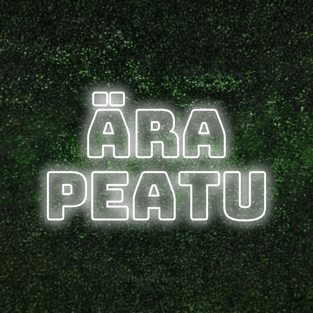 LED neon sign reading “ÄRA PEATU”, arranged in 2 lines.
