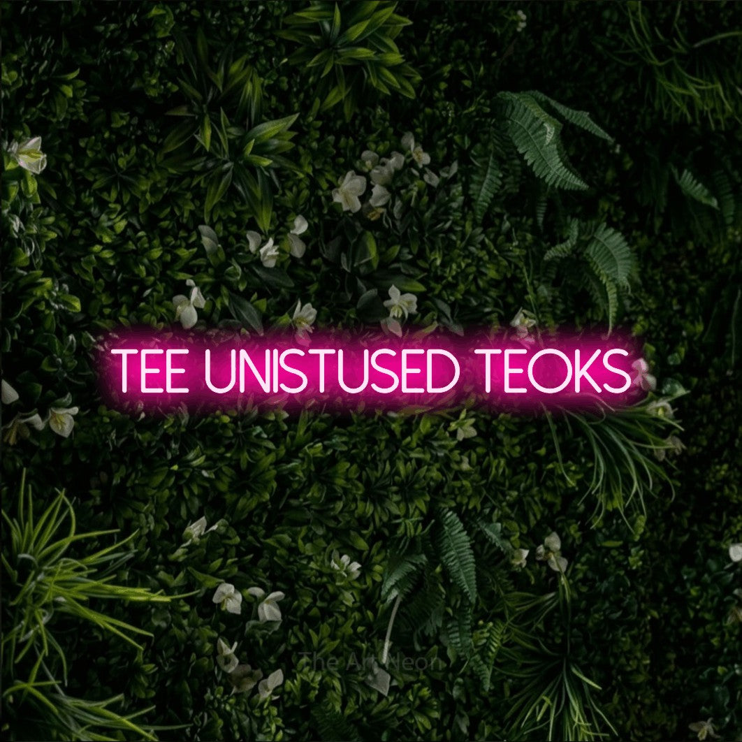 LED neon sign reading “Tee unistused teoks”, arranged in a single line.