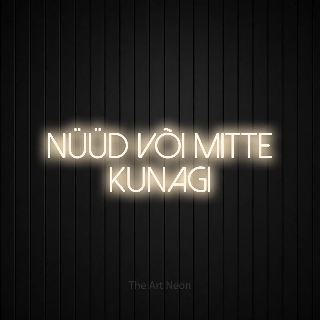 LED neon sign reading “nüüd või mitte kunagi”, arranged in 2 lines.