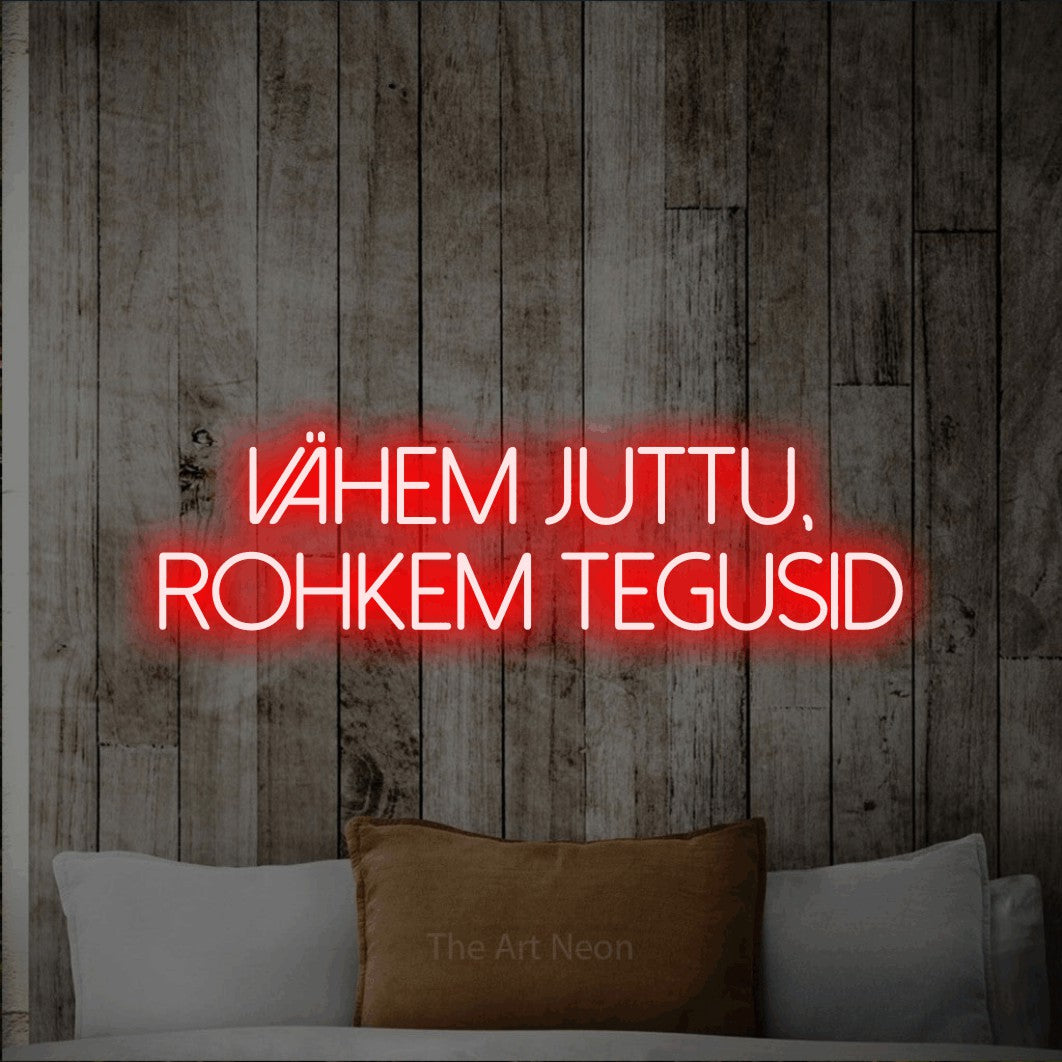LED neon sign reading “VÄHEM JUTTU, ROHKEM TEGUSID”, arranged in 2 lines.