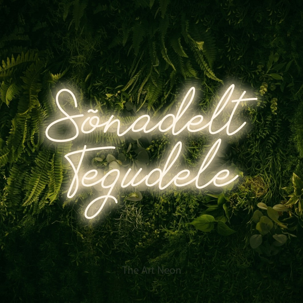 LED neon sign reading “Sõnadelt Tegudele”, arranged in 2 lines.