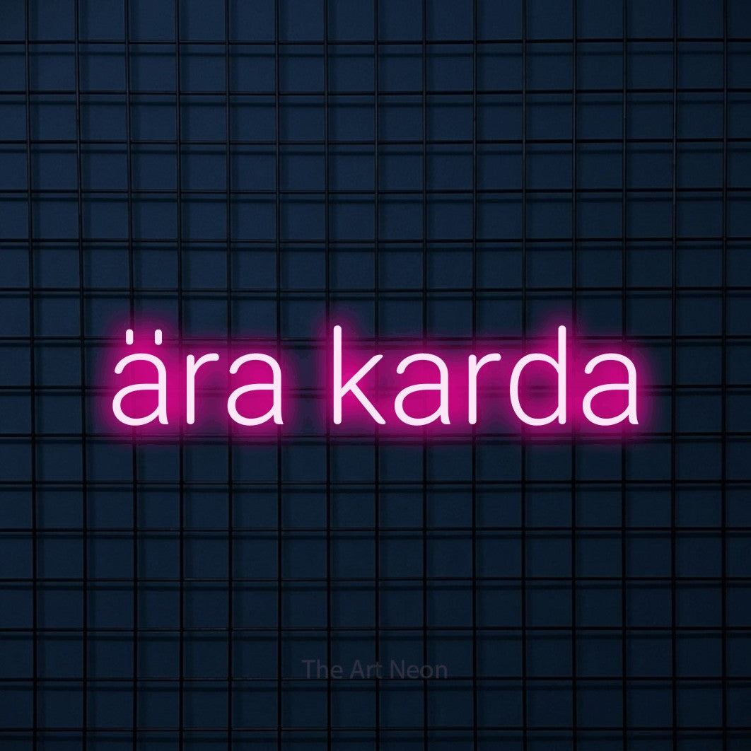 LED neon sign reading “ära karda”, arranged in a single line.
