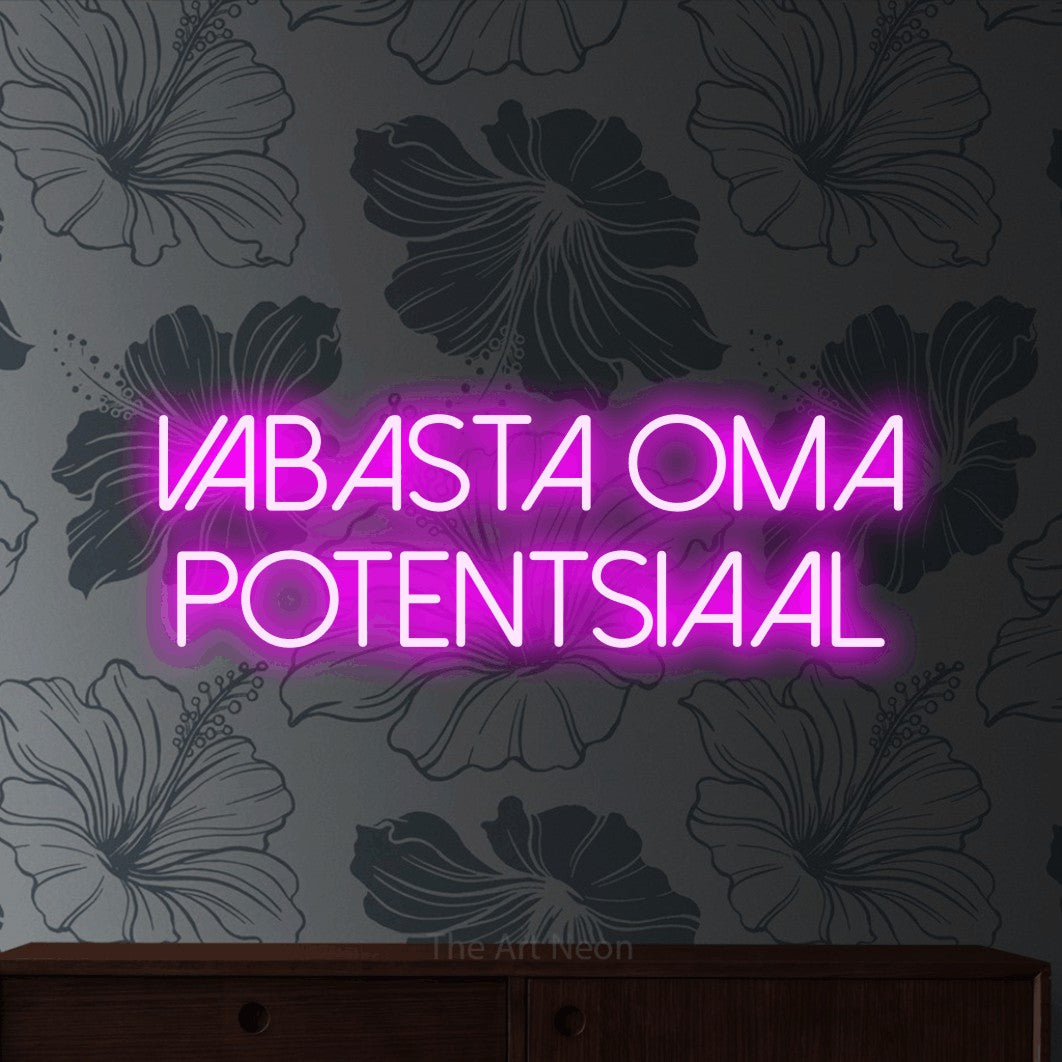 LED neon sign reading “VABASTA OMA POTENTSIAAL”, arranged in 2 lines.