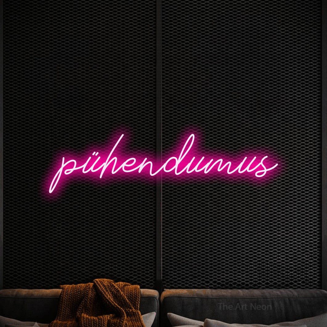 LED neon sign reading “pühendumus”, arranged in a single line.
