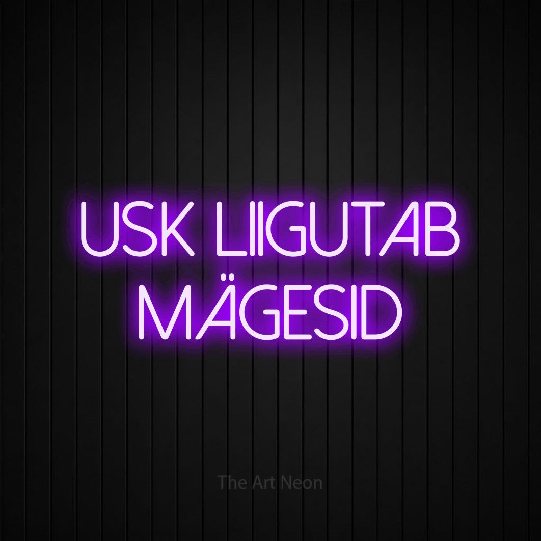 LED neon sign reading “Usk Liigutab Mägesid”, arranged in 2 lines.