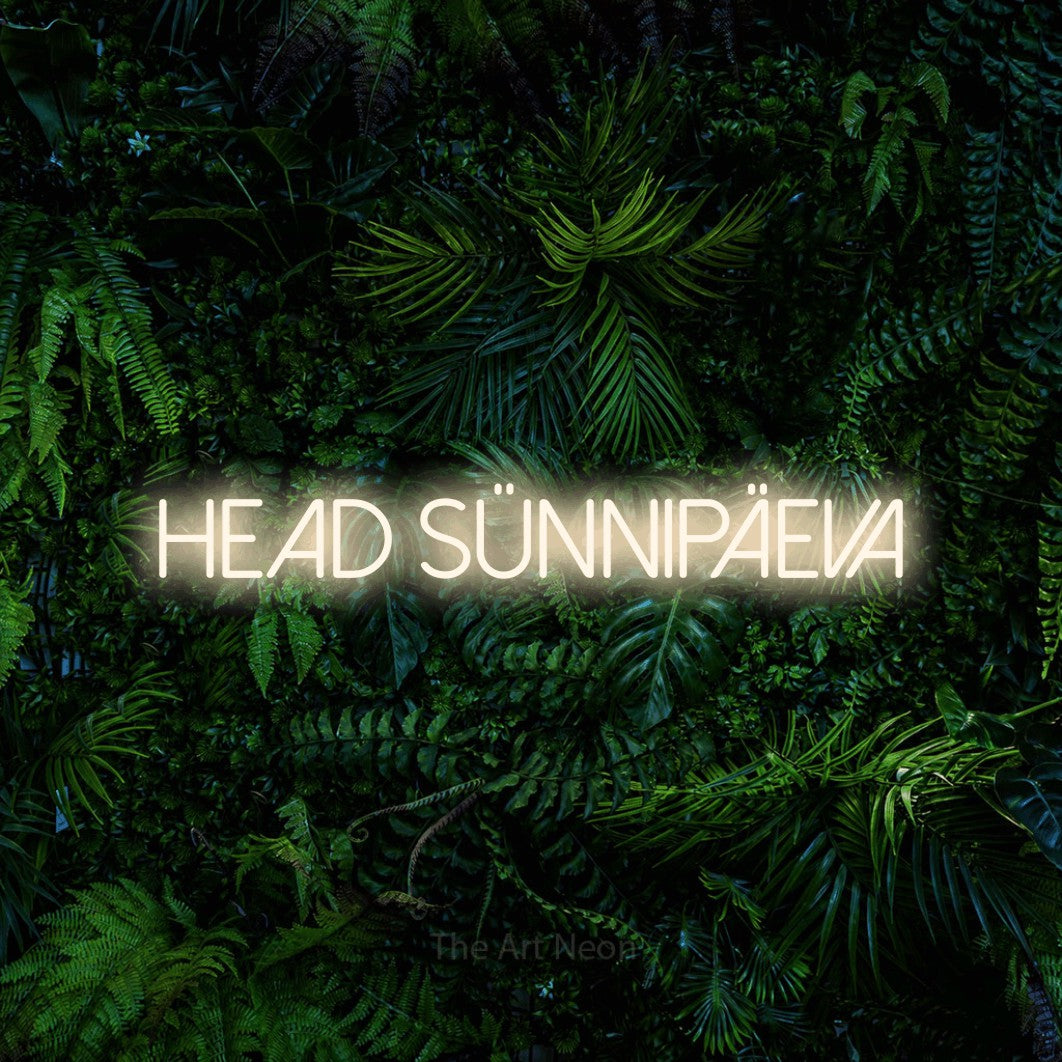 LED neon sign reading “HEAD SÜNNIPÄEVA”, arranged in a single line.