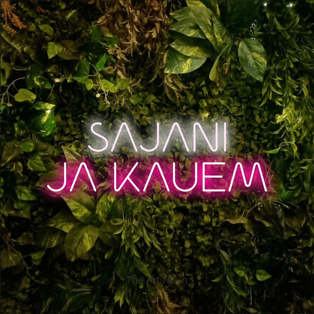 LED neon sign reading “SAJANI JA KAUEM”, arranged in 2 lines.