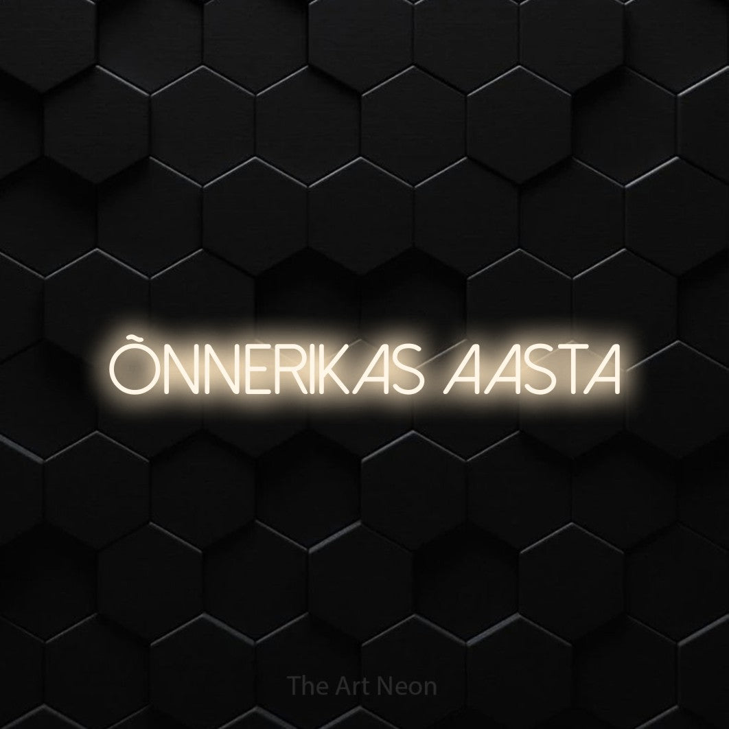 LED neon sign reading “õnnerikas aasta”, arranged in a single line.