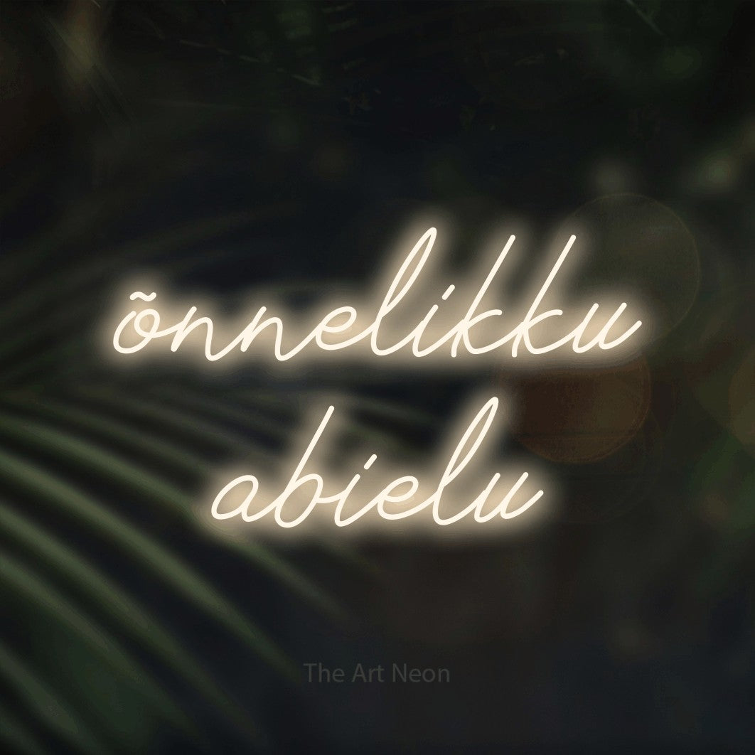 LED neon sign reading “õnnelikku abielu”, arranged in 2 lines.