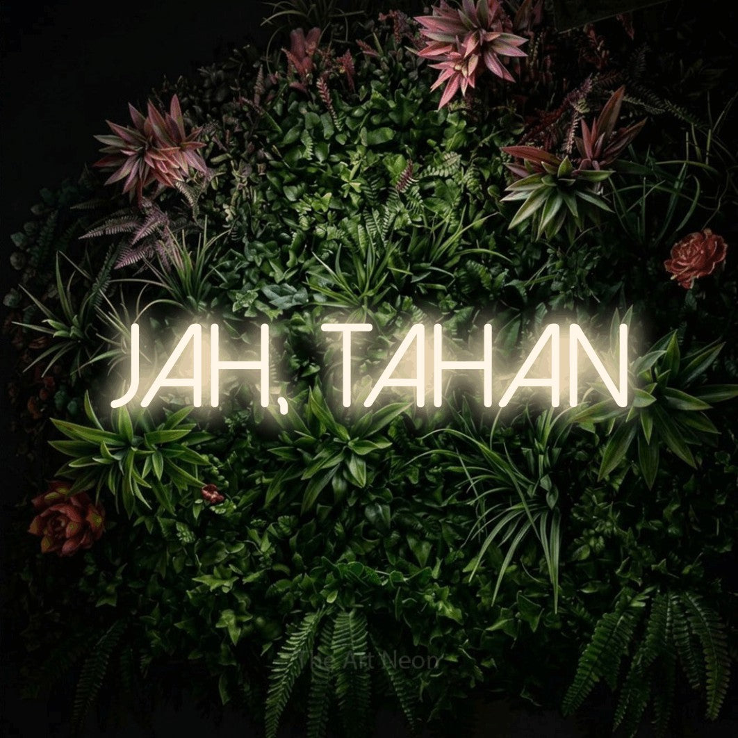 LED neon sign reading “jah, tahan”, arranged in a single line.