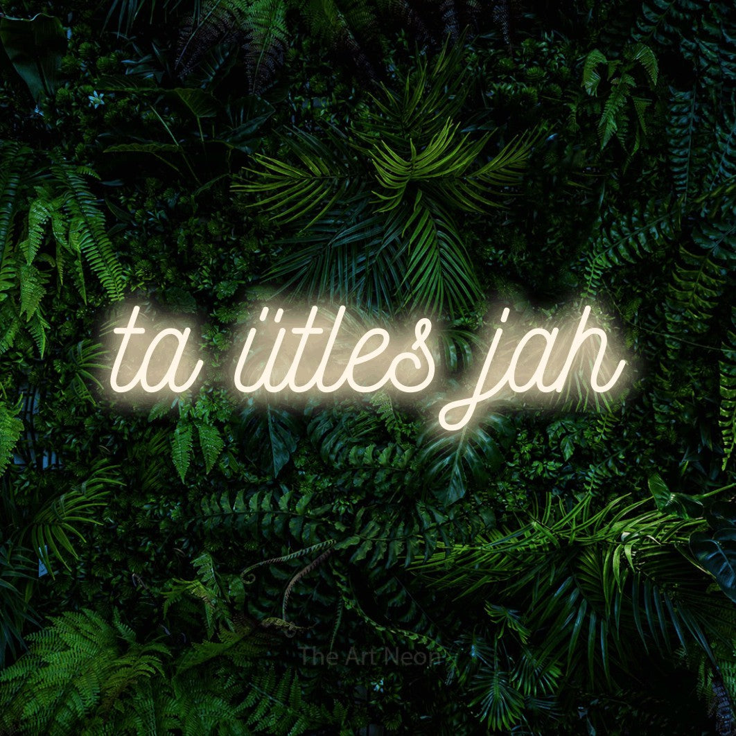 LED neon sign reading “ta ütles jah”, arranged in a single line.