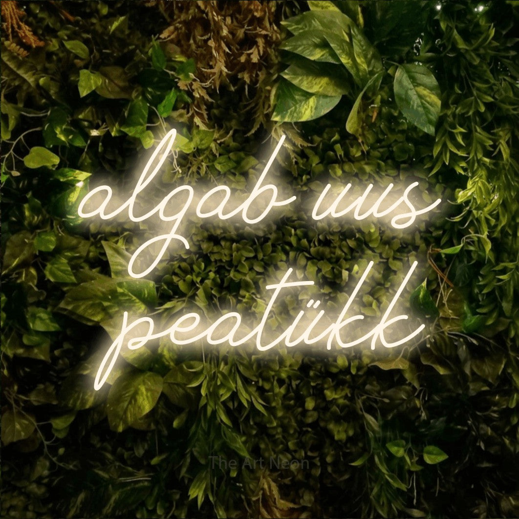 LED neon sign reading “algab uus peatükk”, arranged in 2 lines.