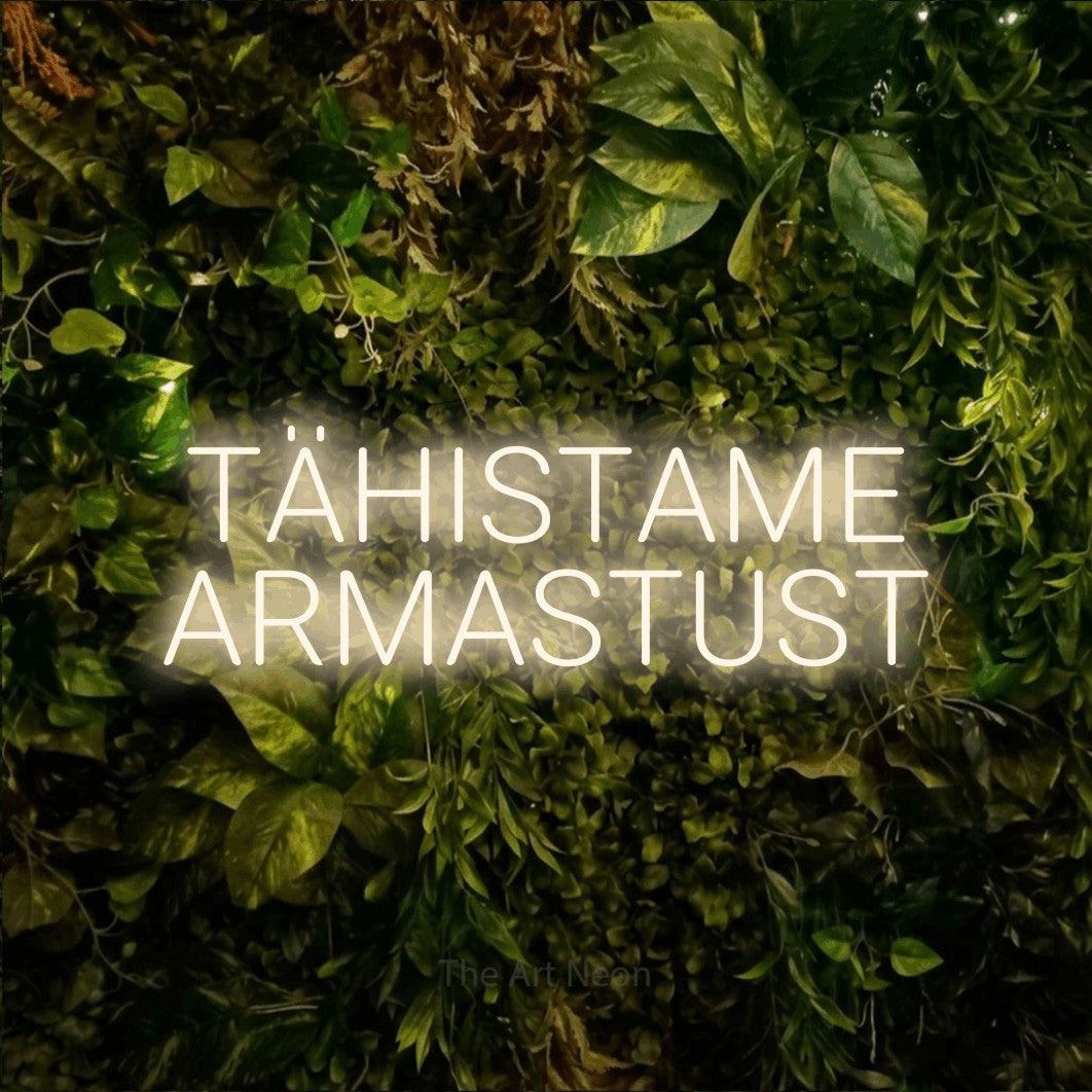 LED neon sign reading “TÄHISTAME ARMASTUST”, arranged in 2 lines.