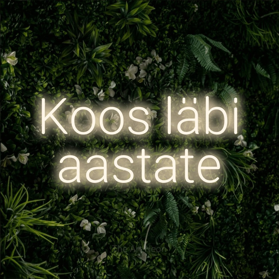 LED neon sign reading “Koos läbi aastate”, arranged in 2 lines.