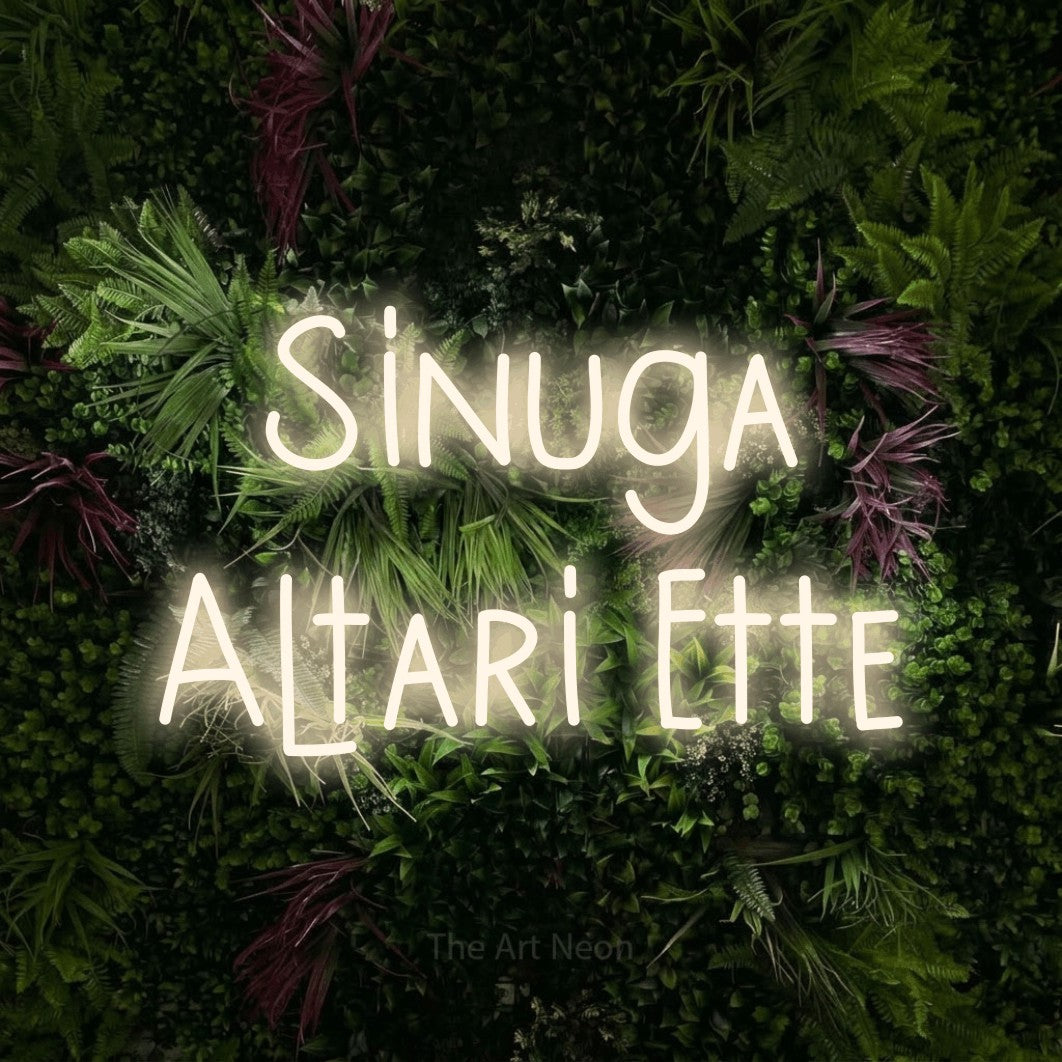 LED neon sign reading “Sinuga Altari Ette”, arranged in 2 lines.