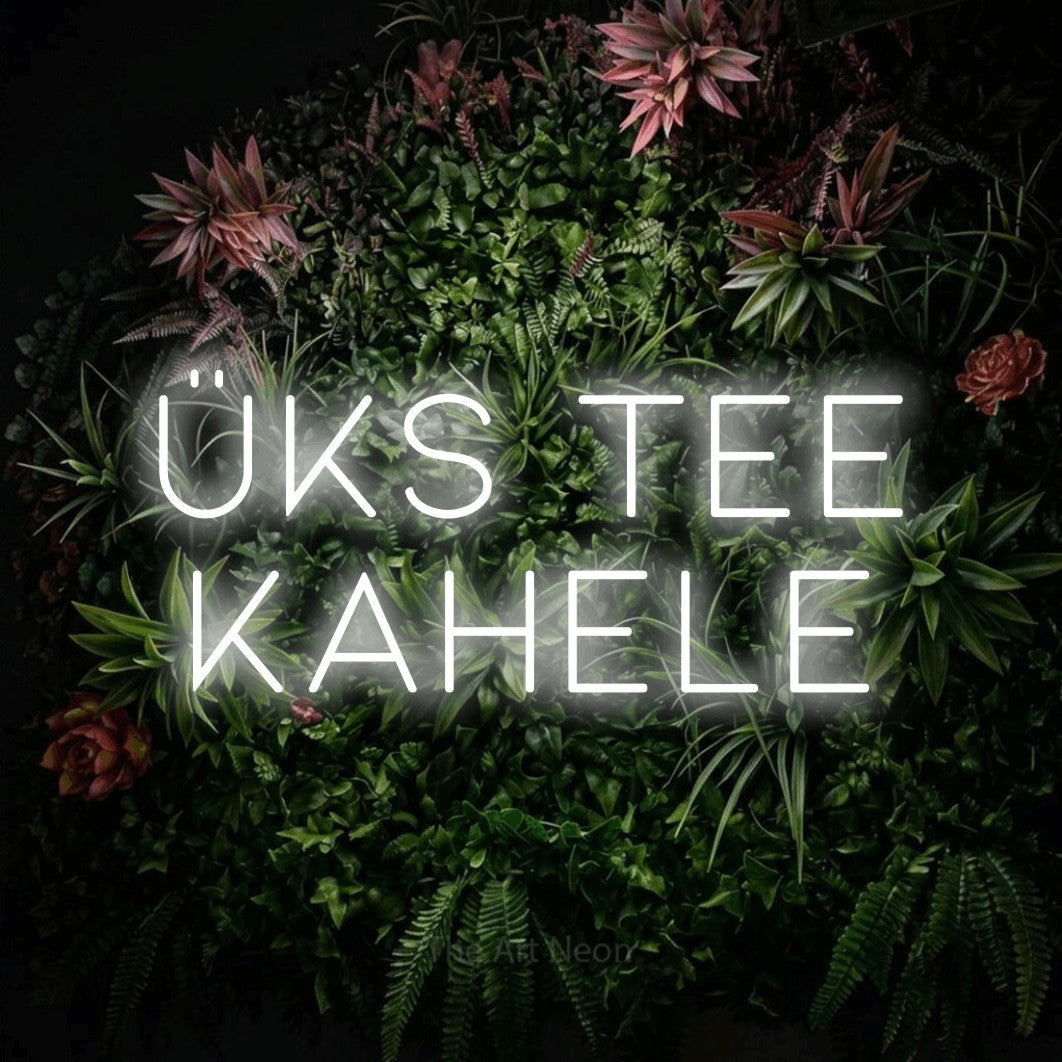 LED neon sign reading “Üks Tee Kahele”, arranged in 2 lines.