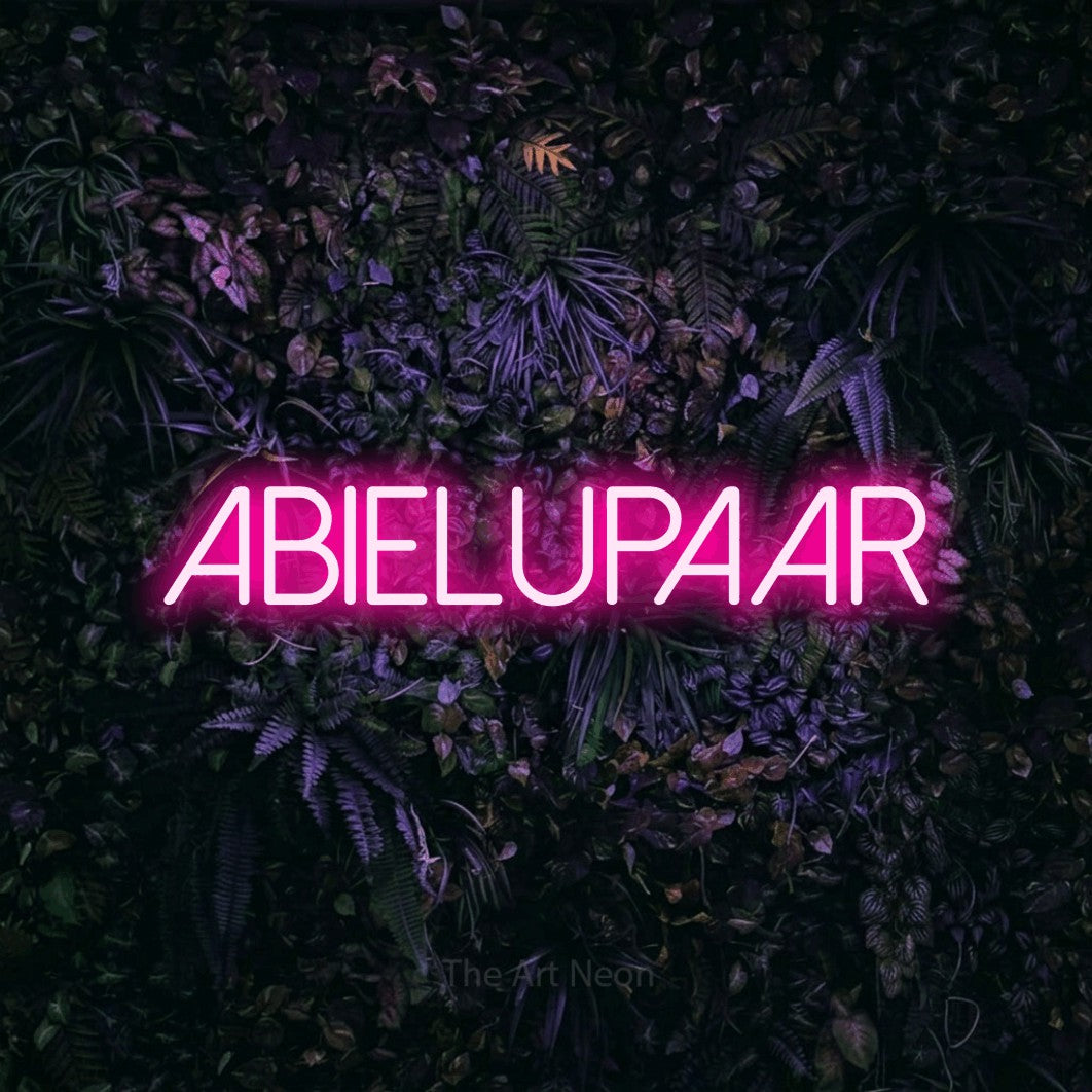 LED neon sign reading “ABIELUPAAR”, arranged in a single line.
