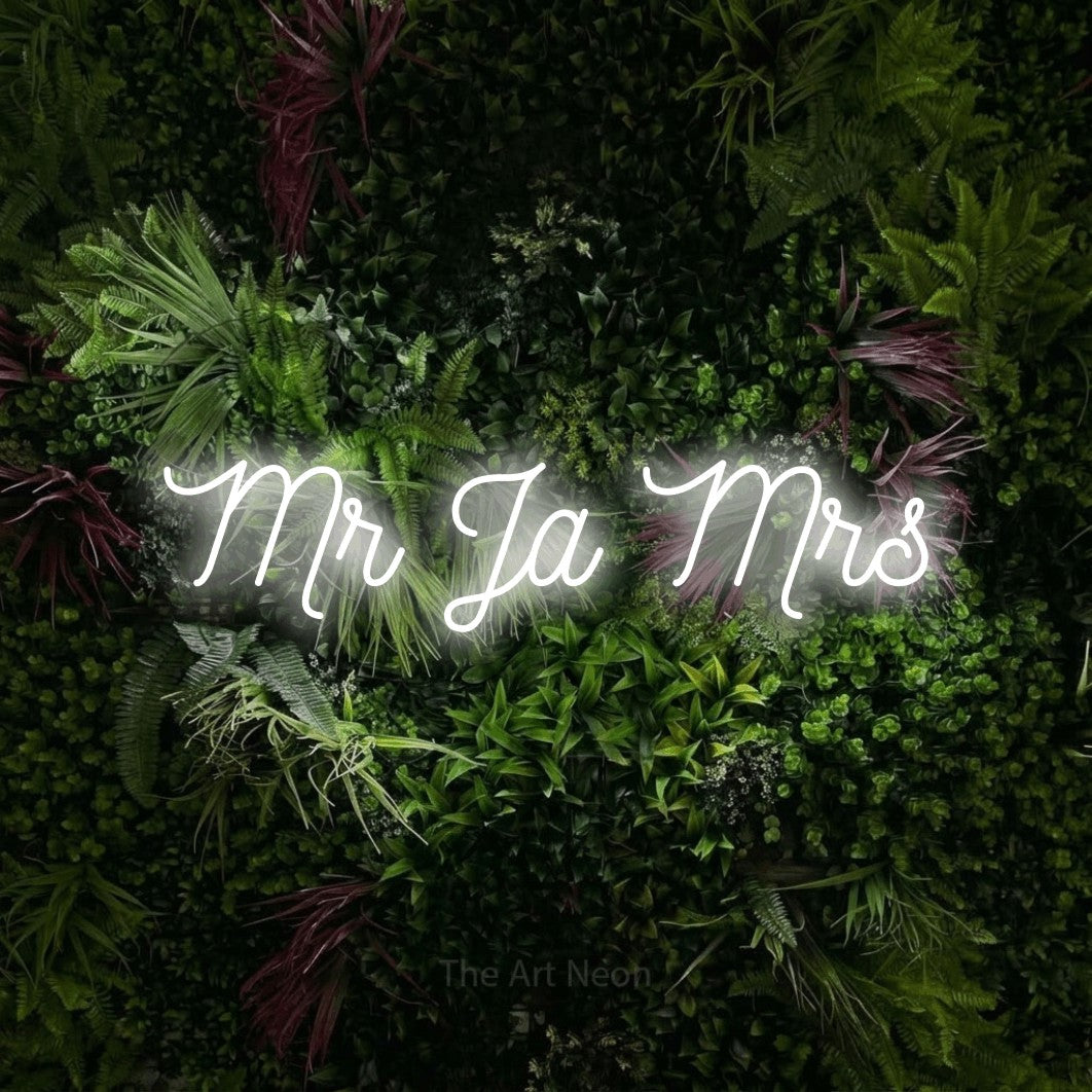 LED neon sign reading “Mr Ja Mrs”, arranged in a single line.