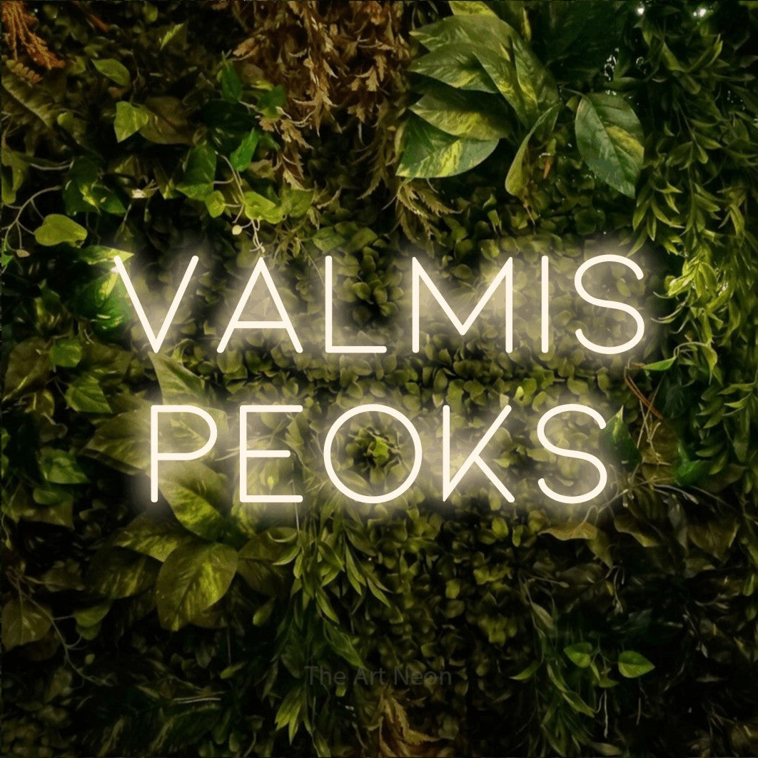 LED neon sign reading “VALMIS PEOKS”, arranged in 2 lines.