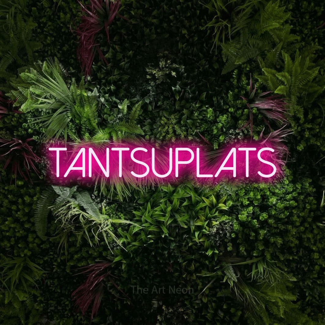 LED neon sign reading “tantsuplats”, arranged in a single line.