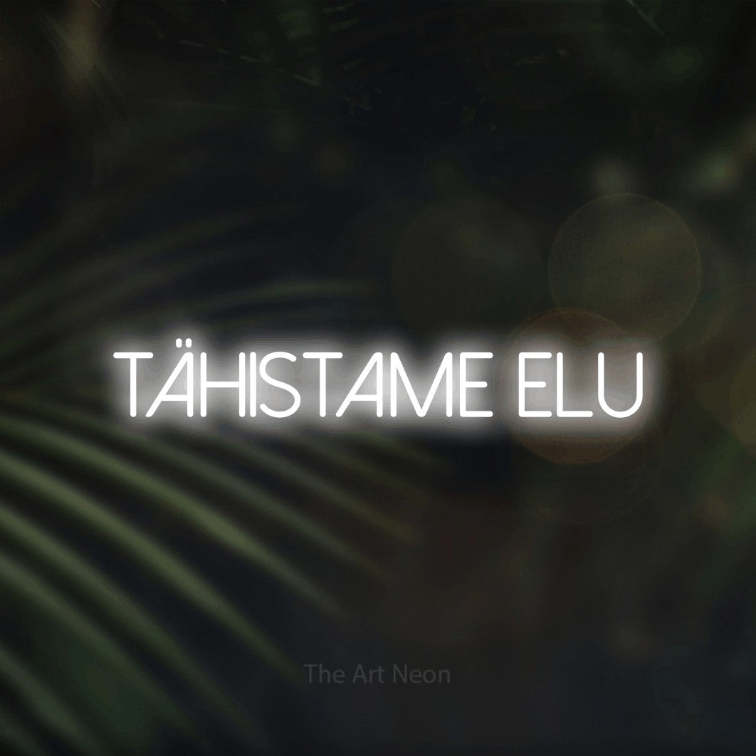 LED neon sign reading “tähistame elu”, arranged in a single line.