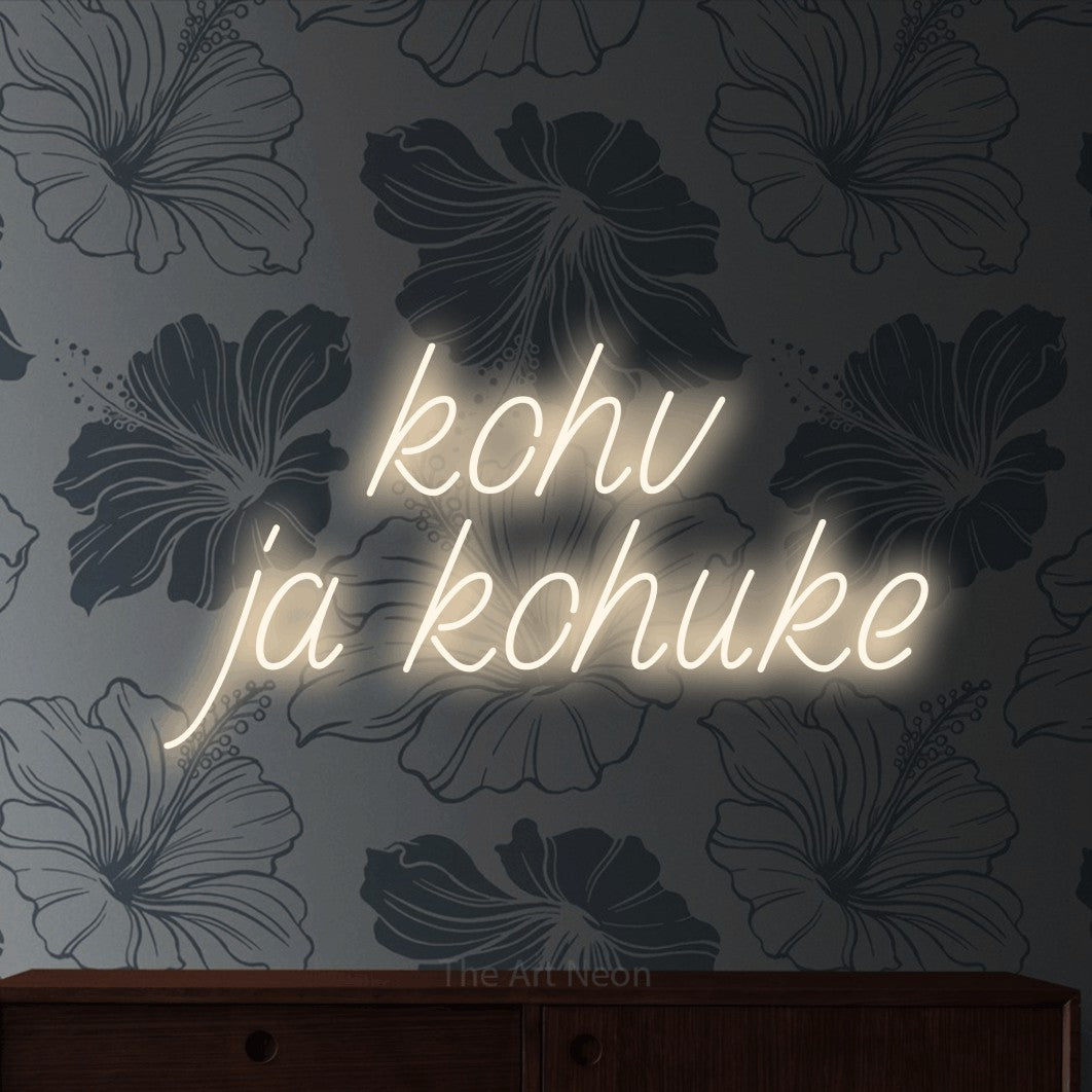 LED neon sign reading “kohv ja kohuke”, arranged in 2 lines.