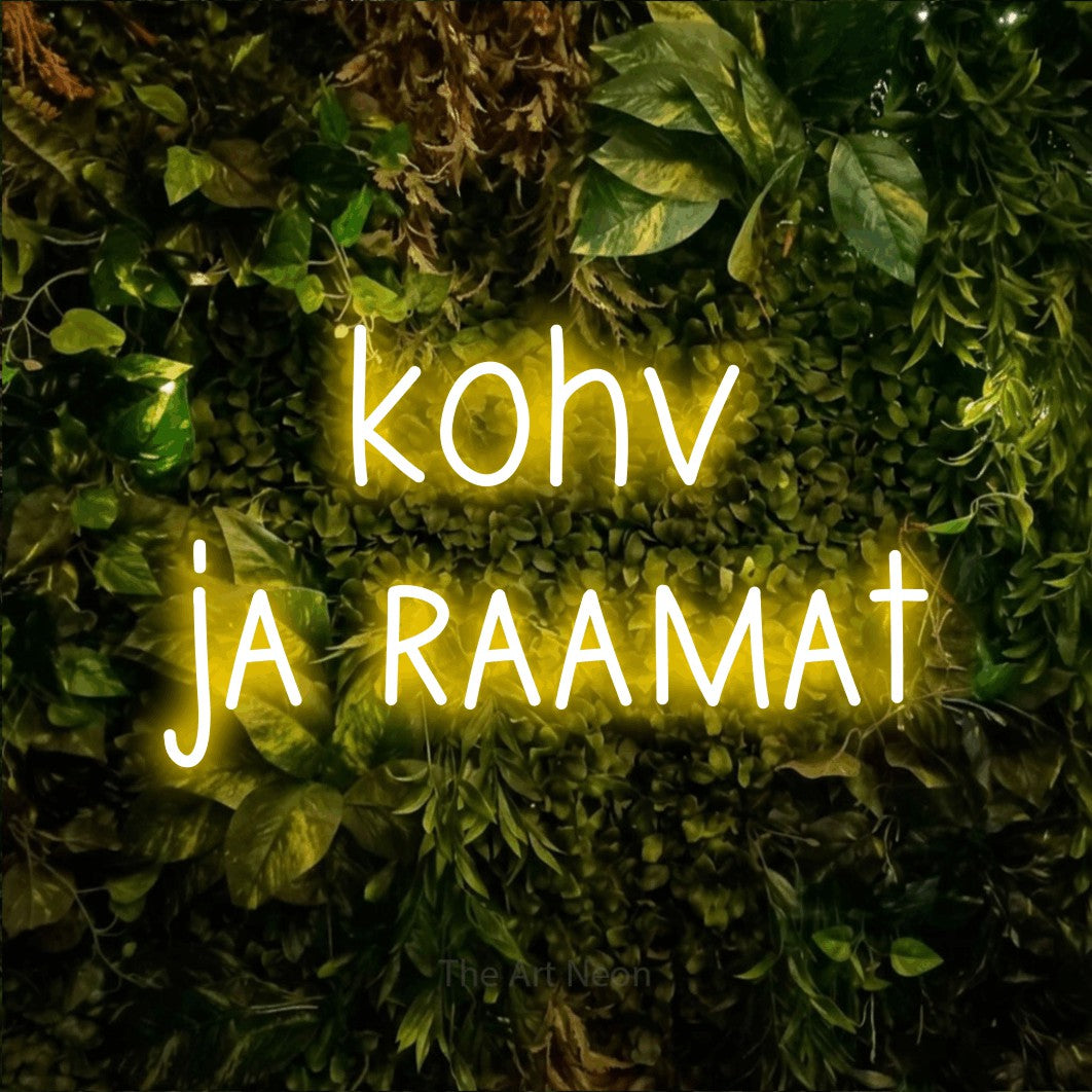LED neon sign reading “kohv ja raamat”, arranged in 2 lines.