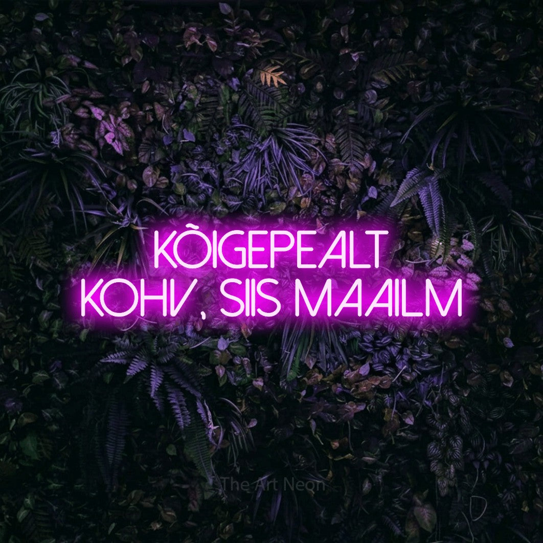 LED neon sign reading “KÕIGEPEALT KOHV, SIIS MAAILM”, arranged in 2 lines.
