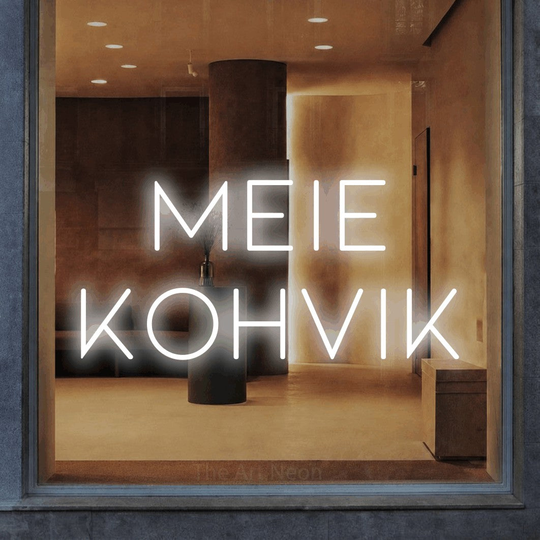LED neon sign reading “MEIE KOHVIK”, arranged in 2 lines.