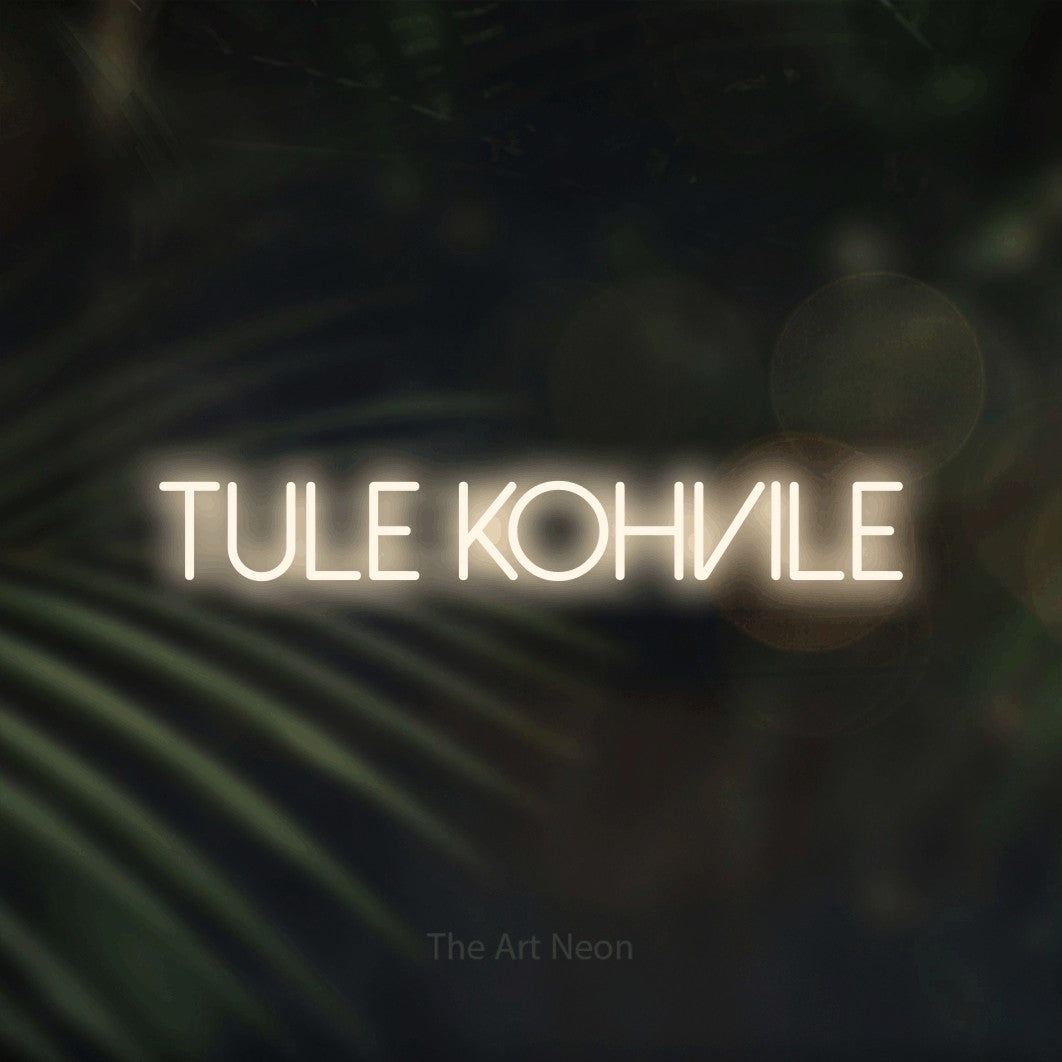 LED neon sign reading “tule kohvile”, arranged in a single line.