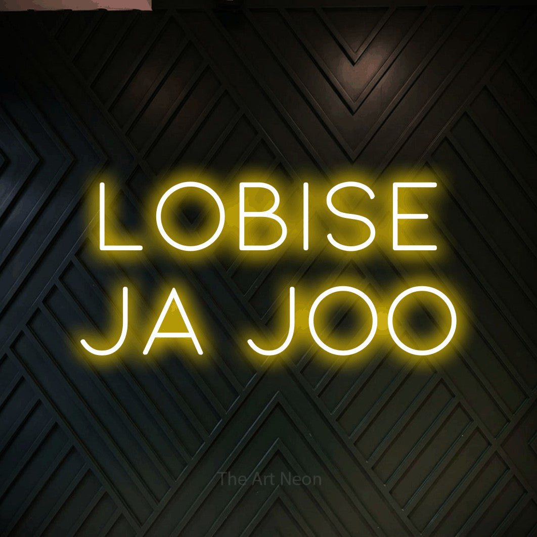 LED neon sign reading “Lobise ja joo”, arranged in 2 lines.
