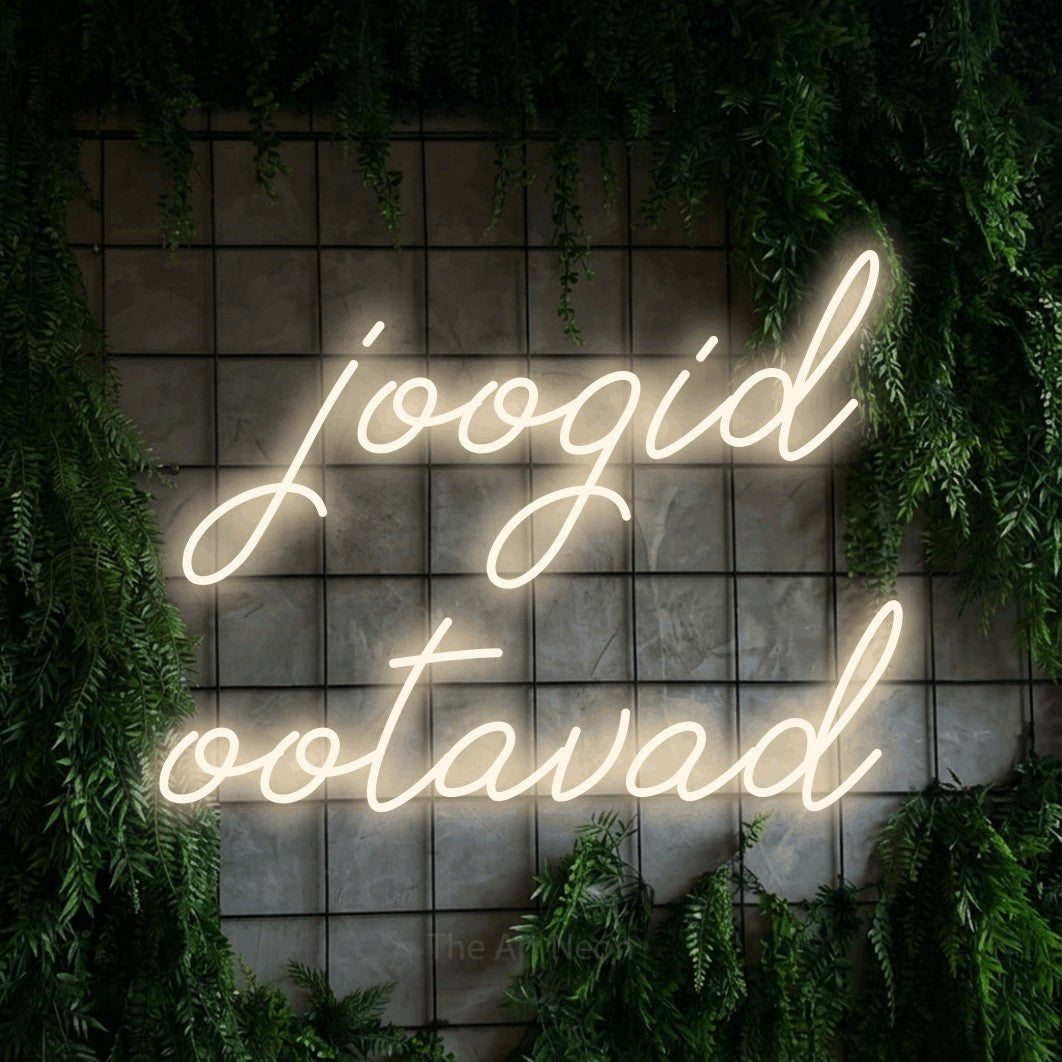 LED neon sign reading “joogid ootavad”, arranged in 2 lines.