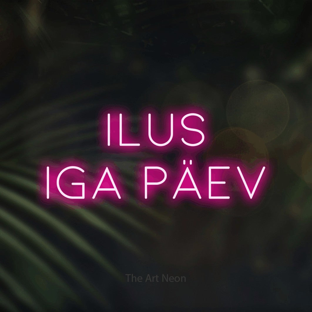 LED neon sign reading “ILUS IGA PÄEV”, arranged in 2 lines.