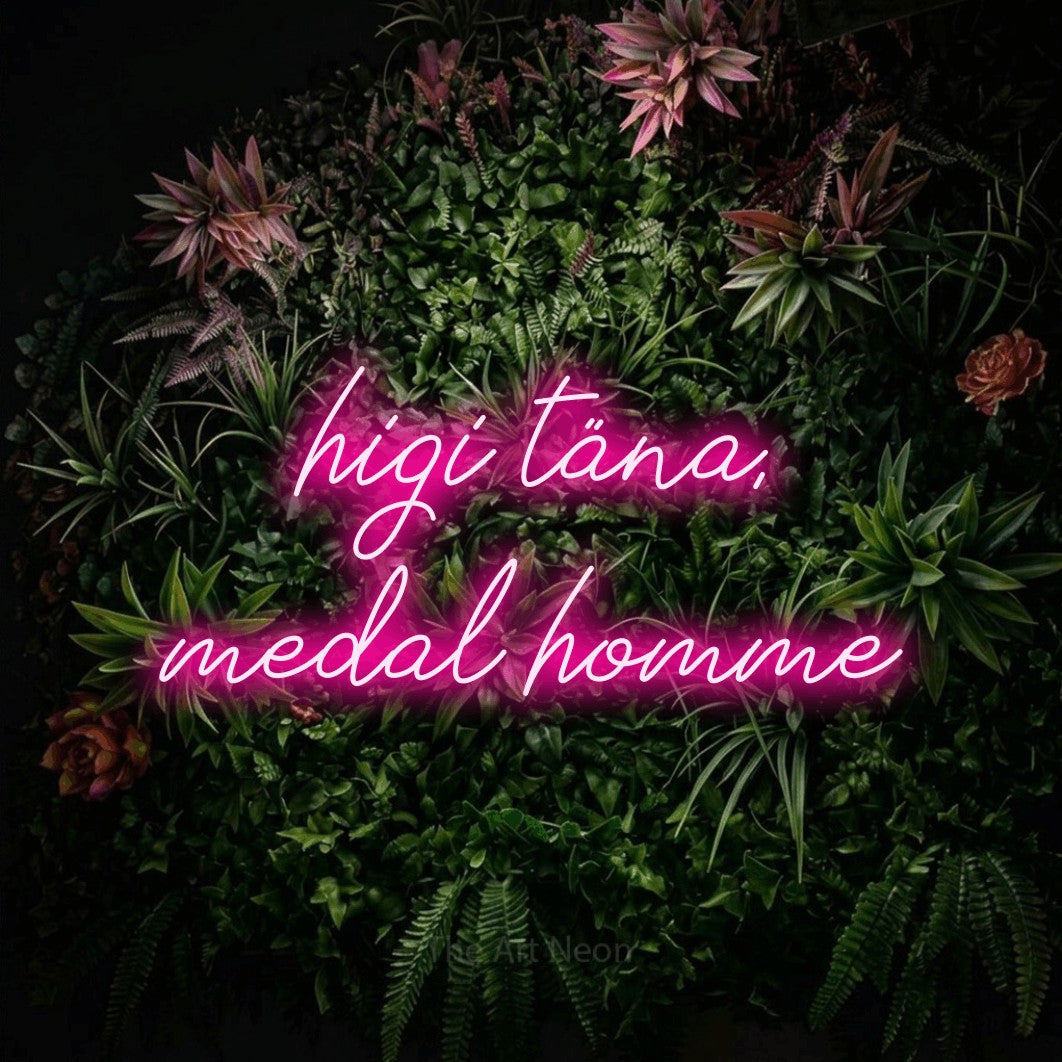 LED neon sign reading “higi täna, medal homme”, arranged in 2 lines.