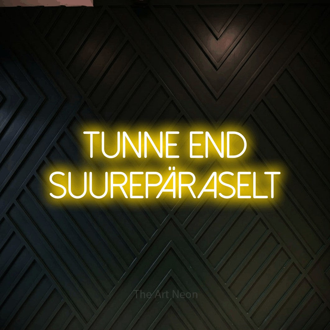 LED neon sign reading “TUNNE End SUUREPÄRASELT”, arranged in 2 lines.