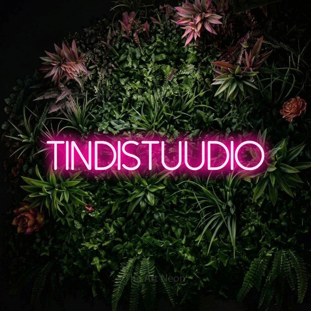 LED neon sign reading “TINDISTUUDIO”, arranged in a single line.