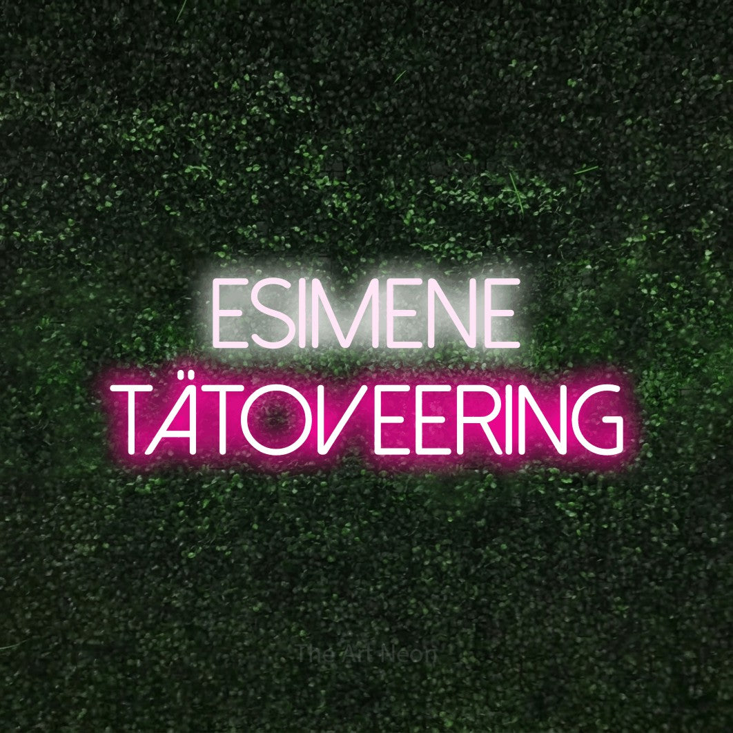 LED neon sign reading “Esimene Tätoveering”, arranged in 2 lines.