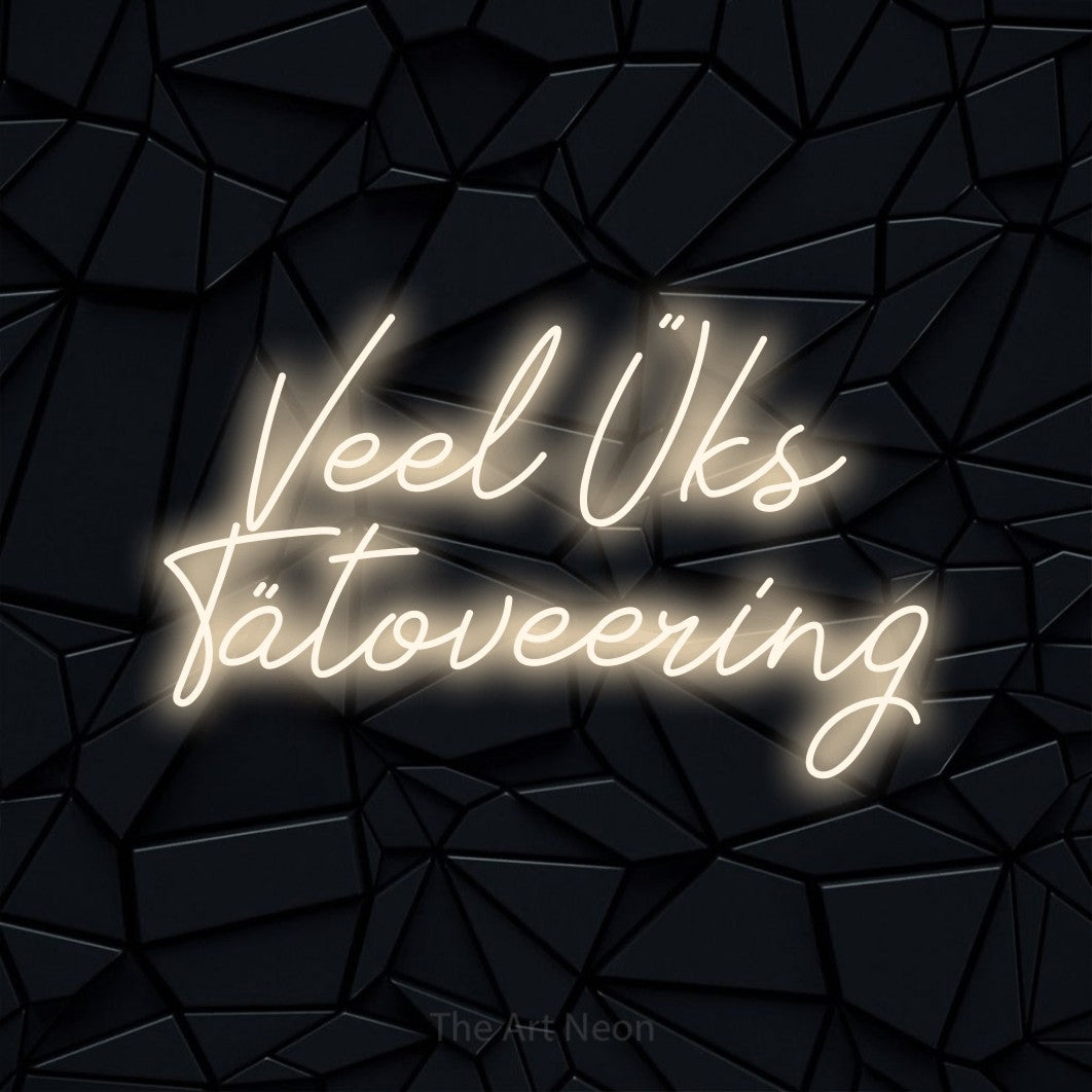 LED neon sign reading “Veel Üks Tätoveering”, arranged in 2 lines.