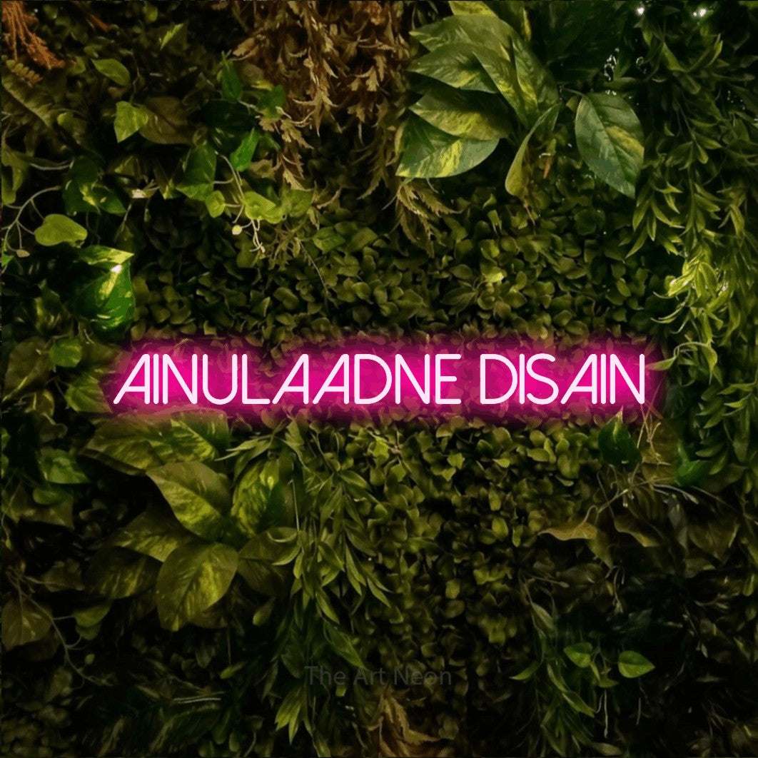 LED neon sign reading “Ainulaadne Disain”, arranged in a single line.