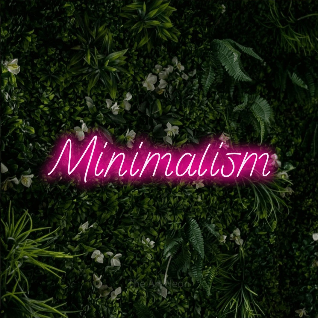 LED neon sign reading “Minimalism”, arranged in a single line.