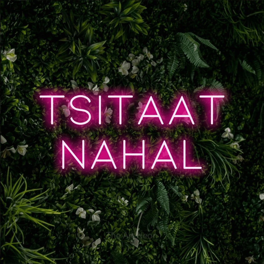 LED neon sign reading “Tsitaat Nahal”, arranged in two lines.