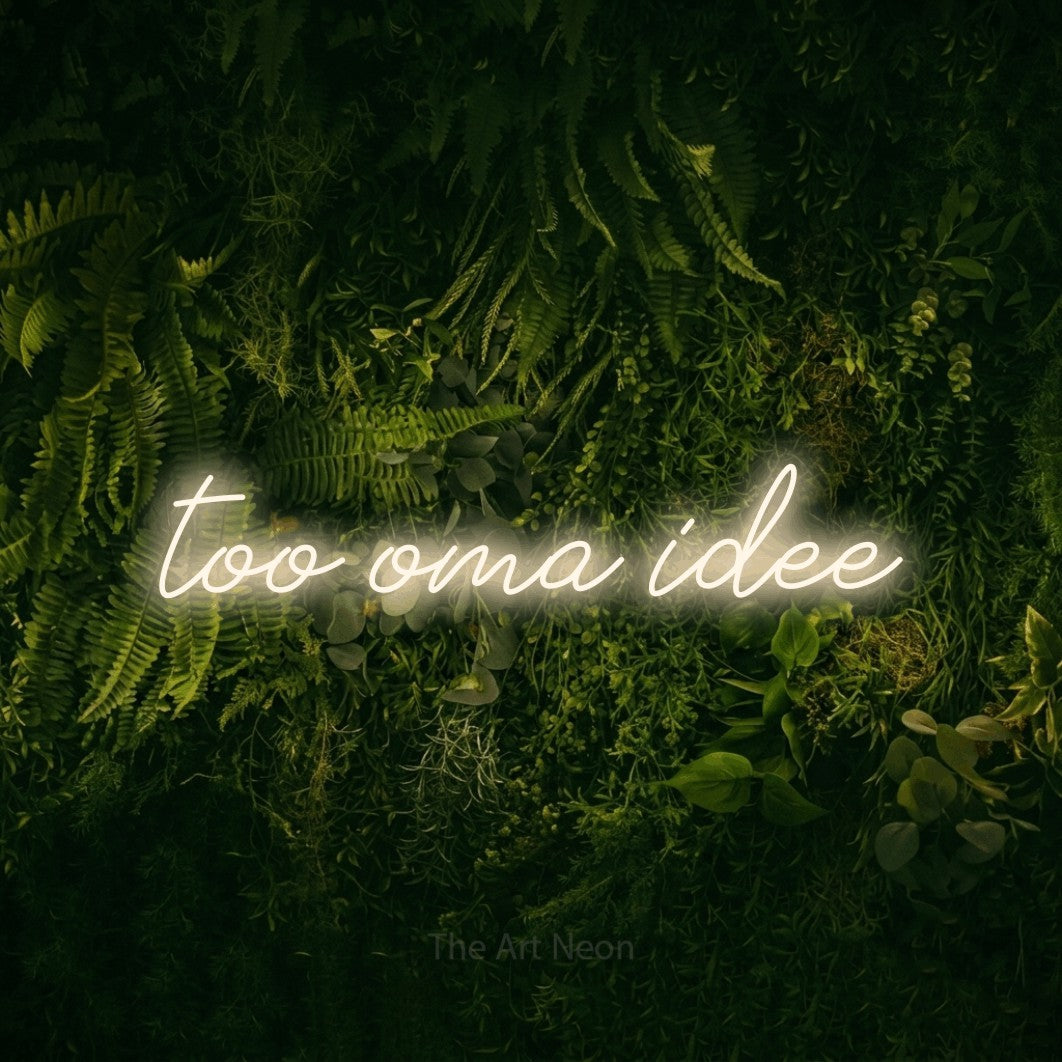 LED neon sign reading “too oma idee”, arranged in a single line.